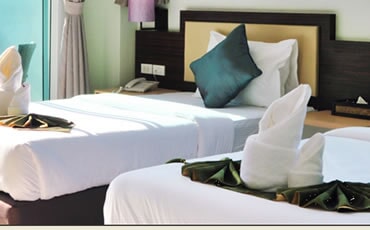 Twin beds at Pretoria Hotel Mbale