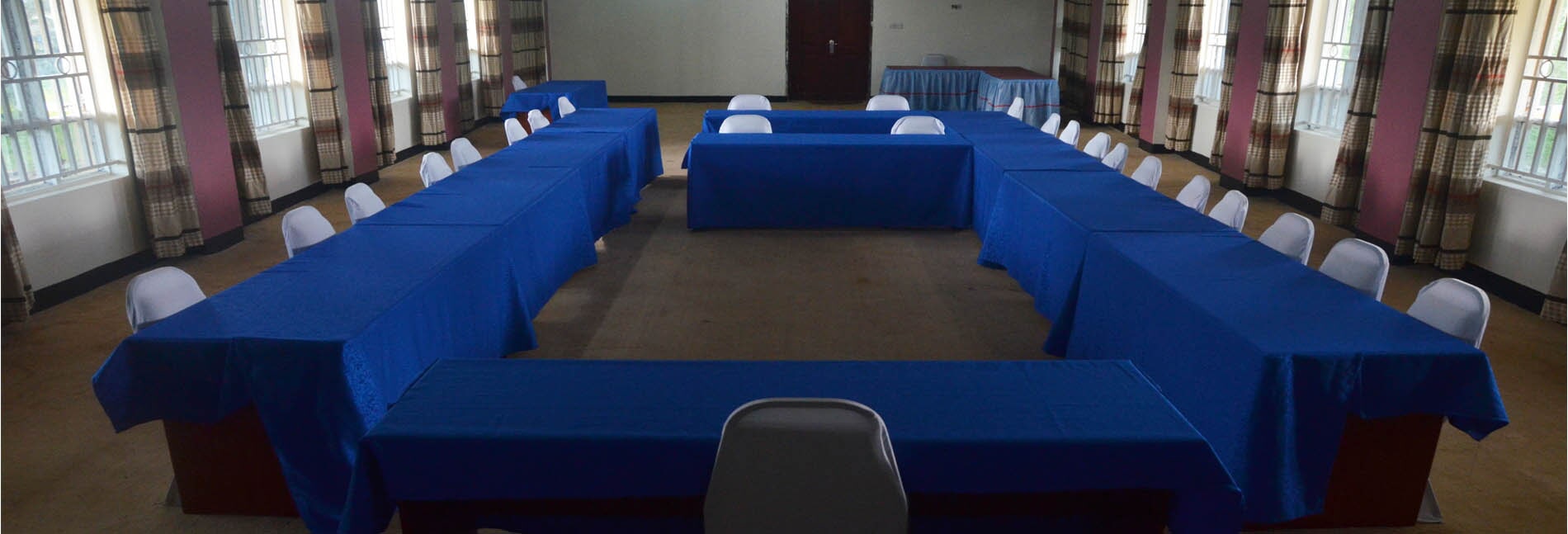 Conference room with blue table coverings